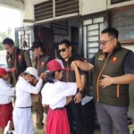 Aksi Nyata! Sabam Salurkan 117 Pasang Sepatu untuk Siswa di Samosir