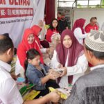 Di Tengah Kabut Asap Karhutla, Gerindra Kalsel Bagikan 400 Paket Beras untuk Warga